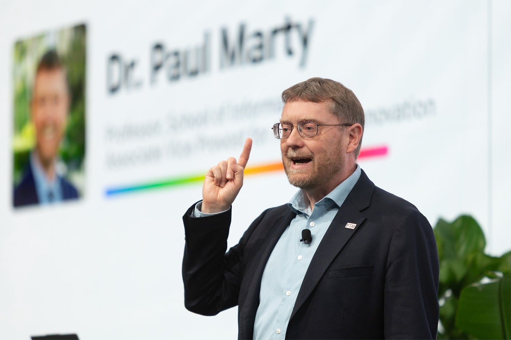 Image of Paul Marty presenting at Google Conference
