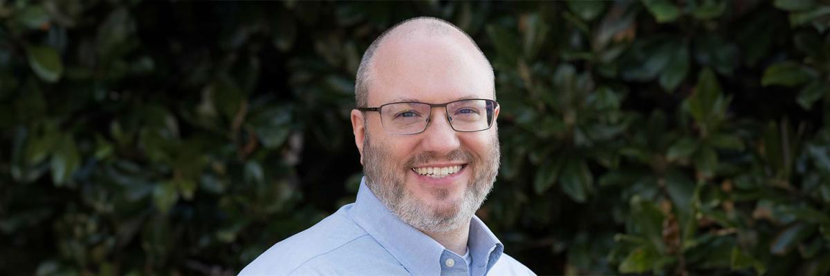 Headshot of John L. Crow